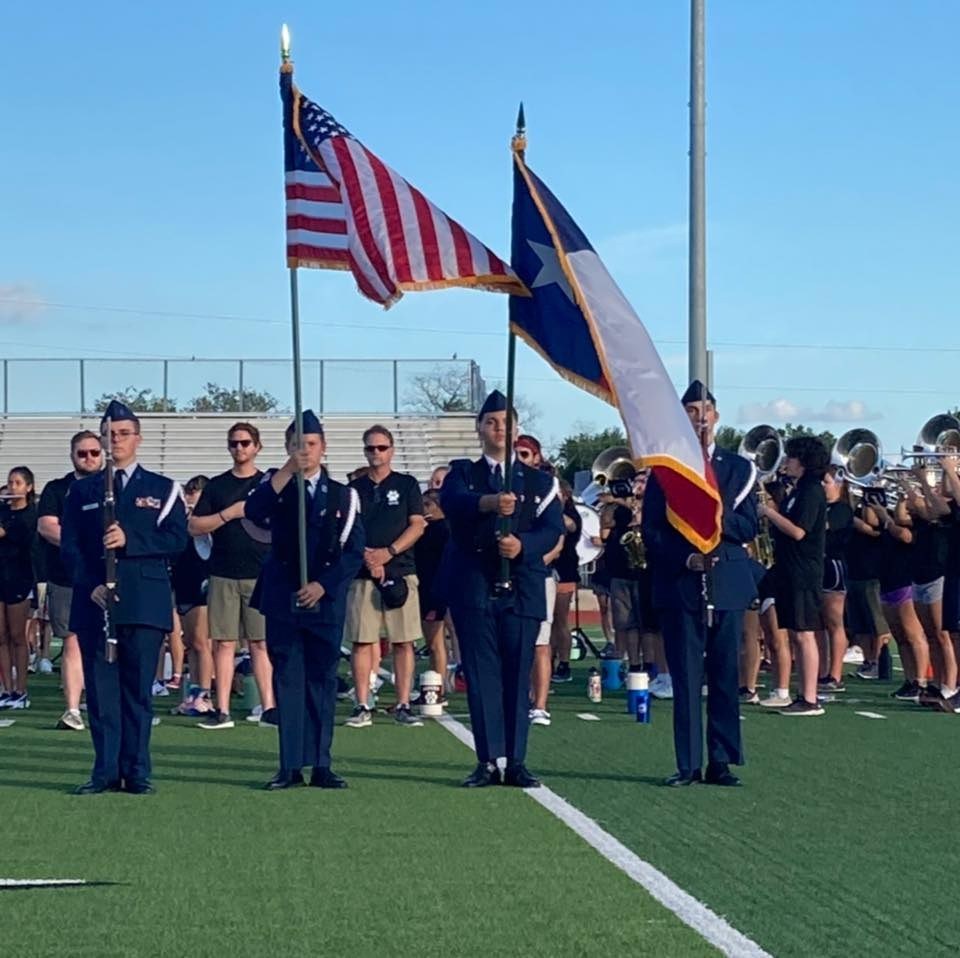 Floresville High School JROTC color guard with U.S. and Texas flags