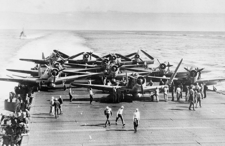 World War II U.S. Navy dive bombers on aircraft carrier flight deck