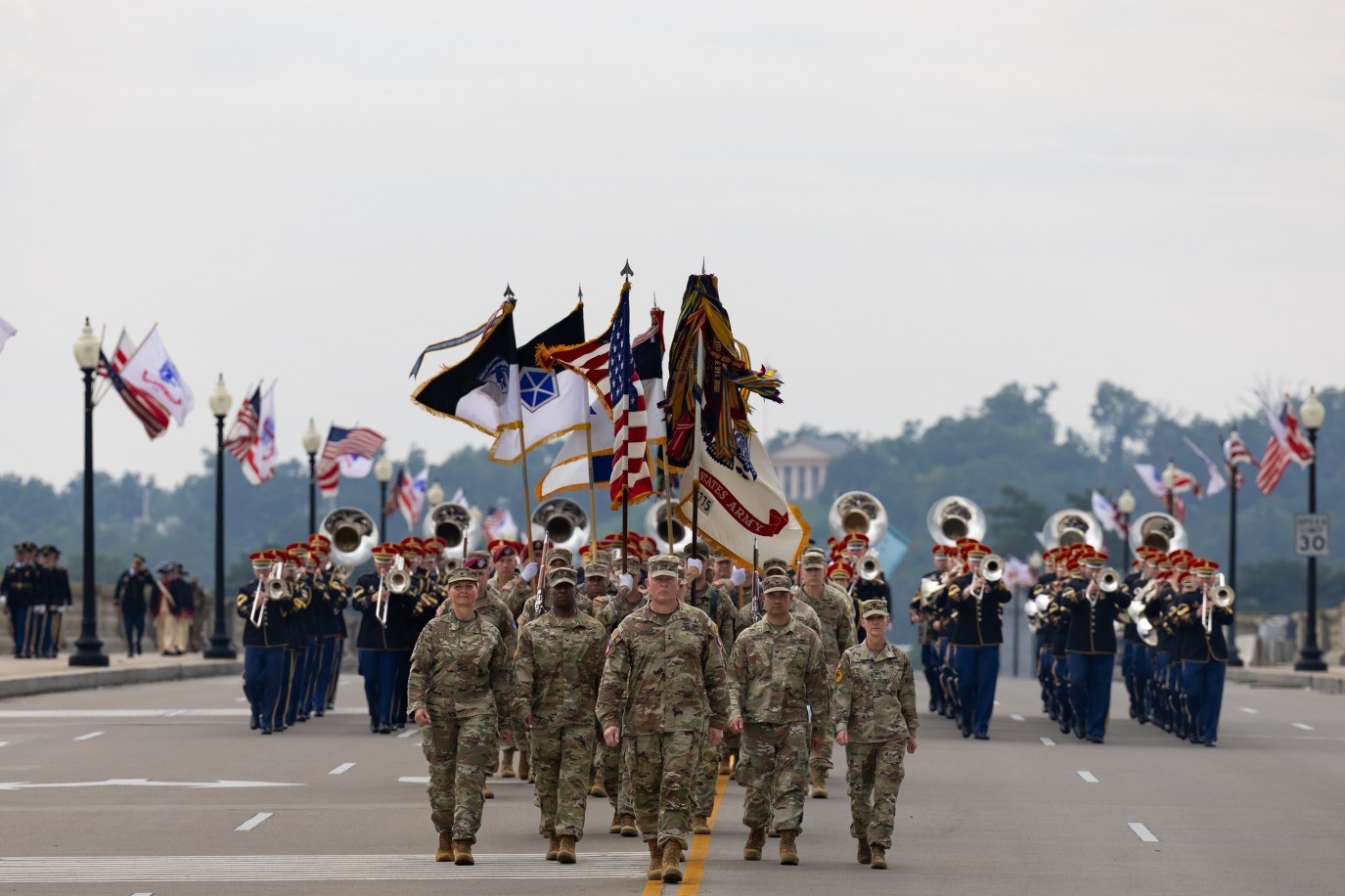 Military unit and color guard marching in Independence Day parade